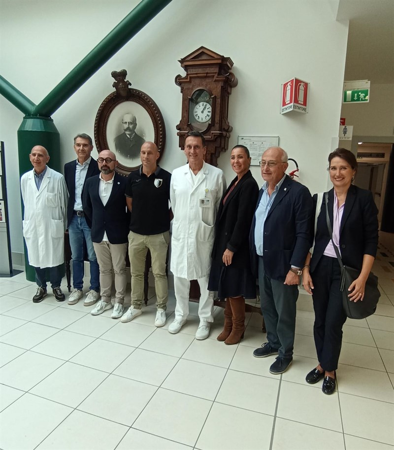 Foto di gruppo nella stanza dell'orologio